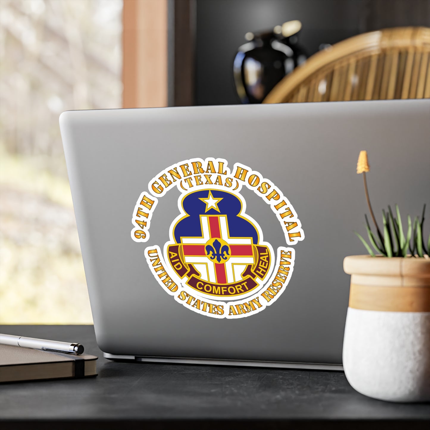 A circular white vinyl decal with a colorful emblem representing the 94th General Hospital, Texas, in the center.