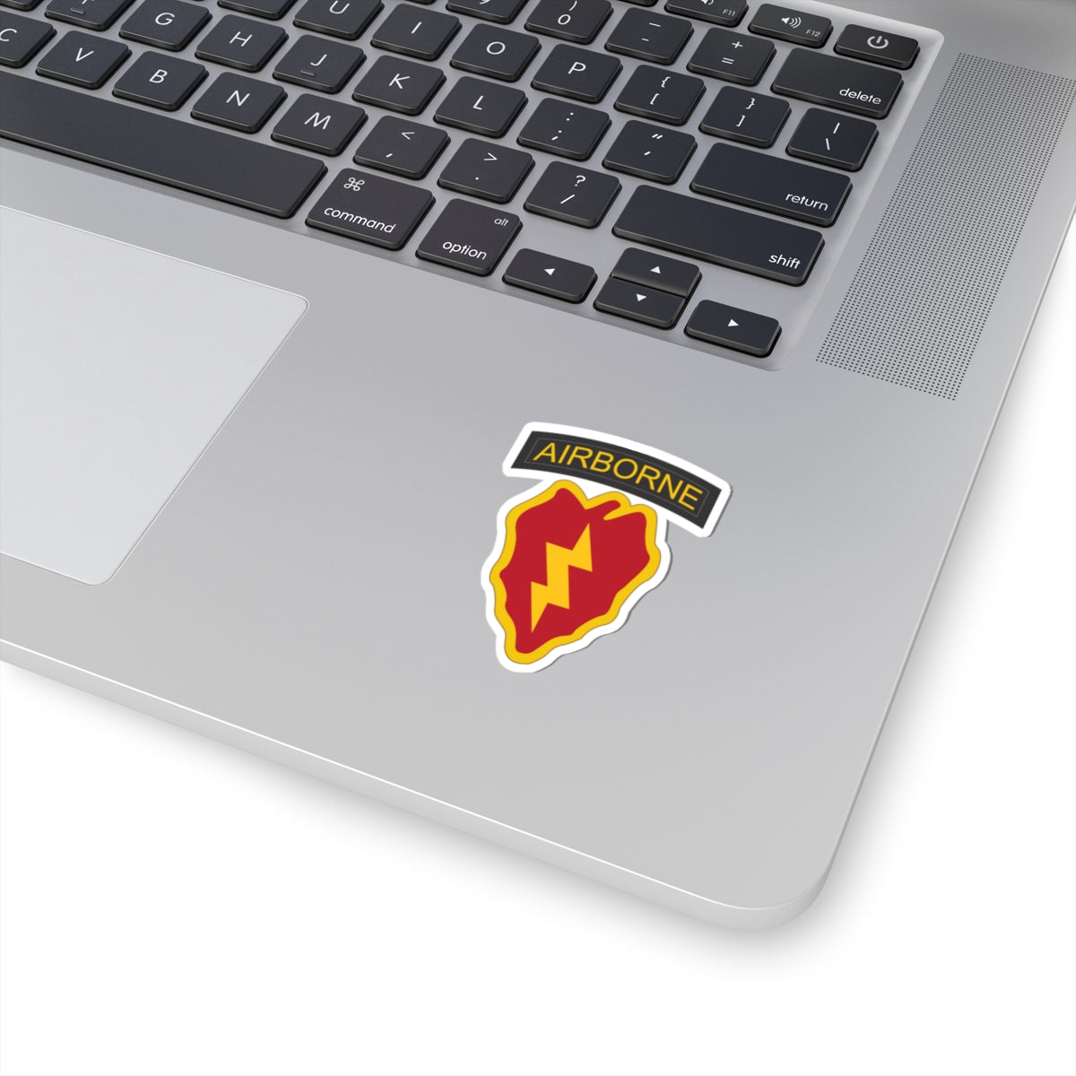 A kiss-Cut Stickers depicting the 25th Infantry Division, known as "Tropic Lightning," is based in Hawaii and is recognized for its rapid-response capabilities in the Pacific region. Its shoulder sleeve insignia (SSI) features a lightning bolt over a taro leaf, symbolizing speed and the unit’s Pacific heritage.