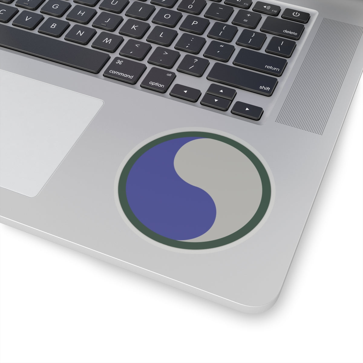 The 29th Infantry Division, known as the "Blue and Gray Division," symbolizes unity between the North and South with its shoulder sleeve insignia (SSI) featuring a yin-yang–style circle split in blue and gray.