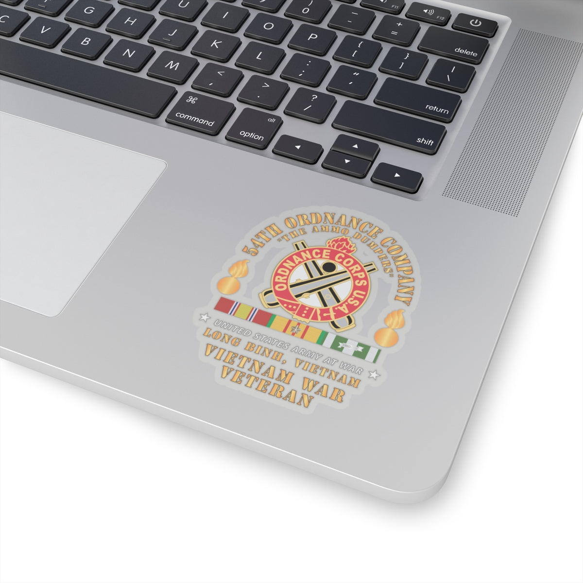 A sticker featuring the emblem of the 54th Ordnance Company with a 'Vietnam War Veteran' inscription and decorative elements in red, white, and yellow colors.