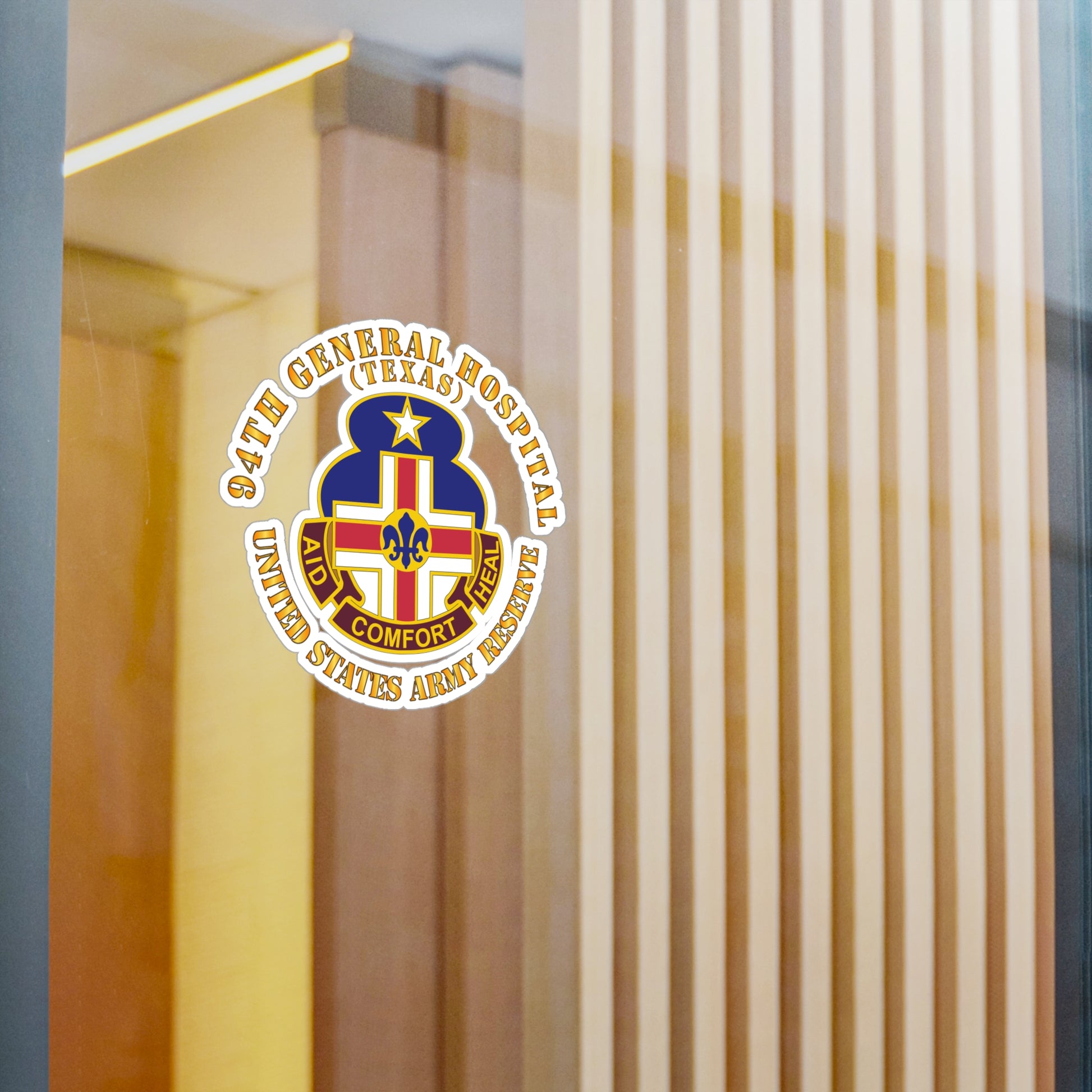 A circular white vinyl decal with a colorful emblem representing the 94th General Hospital, Texas, in the center.