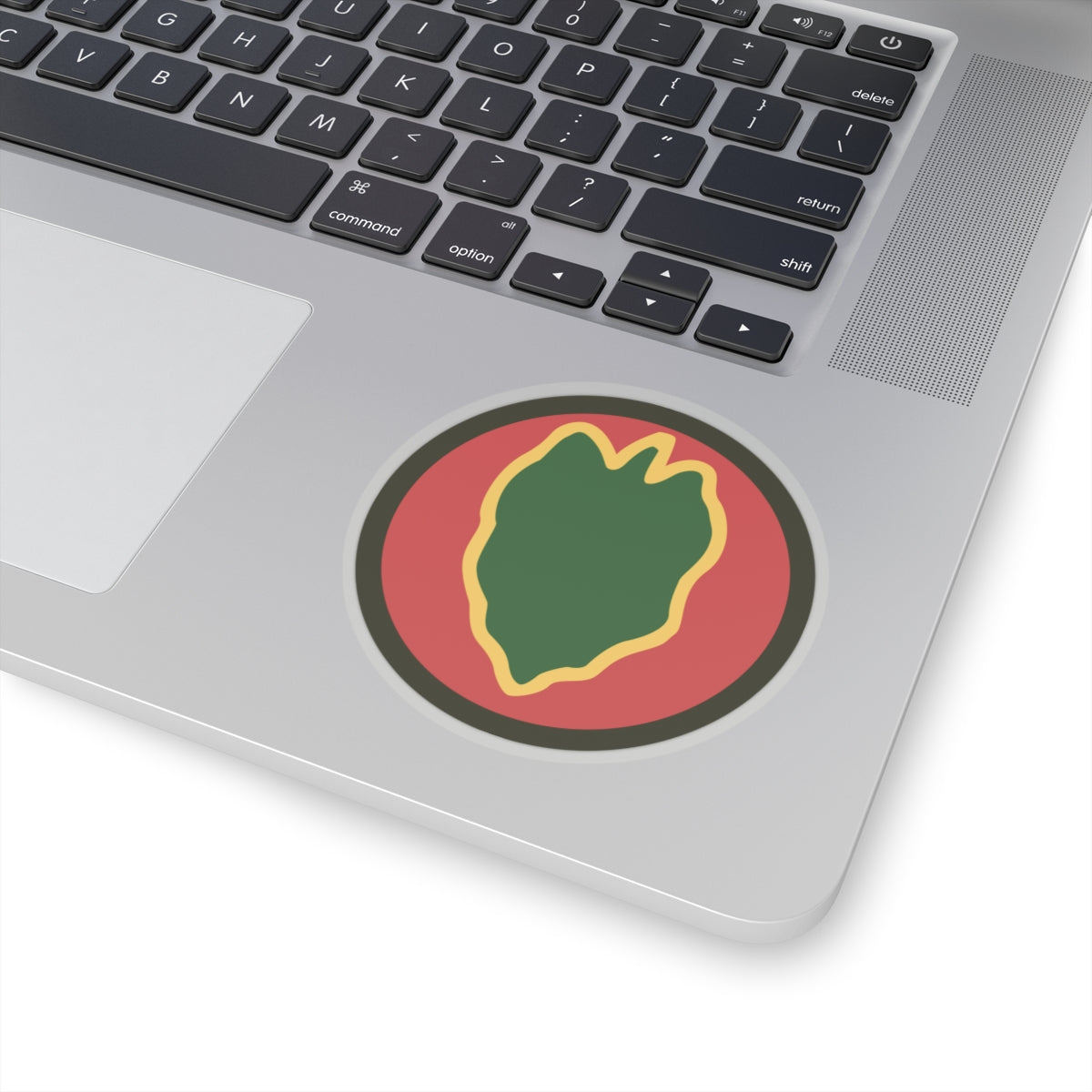 A kiss-Cut Stickers depicting the 24th Infantry Division, nicknamed the "Victory Division," was a U.S. Army division known for its service in World War II, the Korean War, and Operation Desert Storm. Its shoulder sleeve insignia (SSI) features a green taro leaf on a red circular background, symbolizing its origins in Hawaii and the Pacific.
