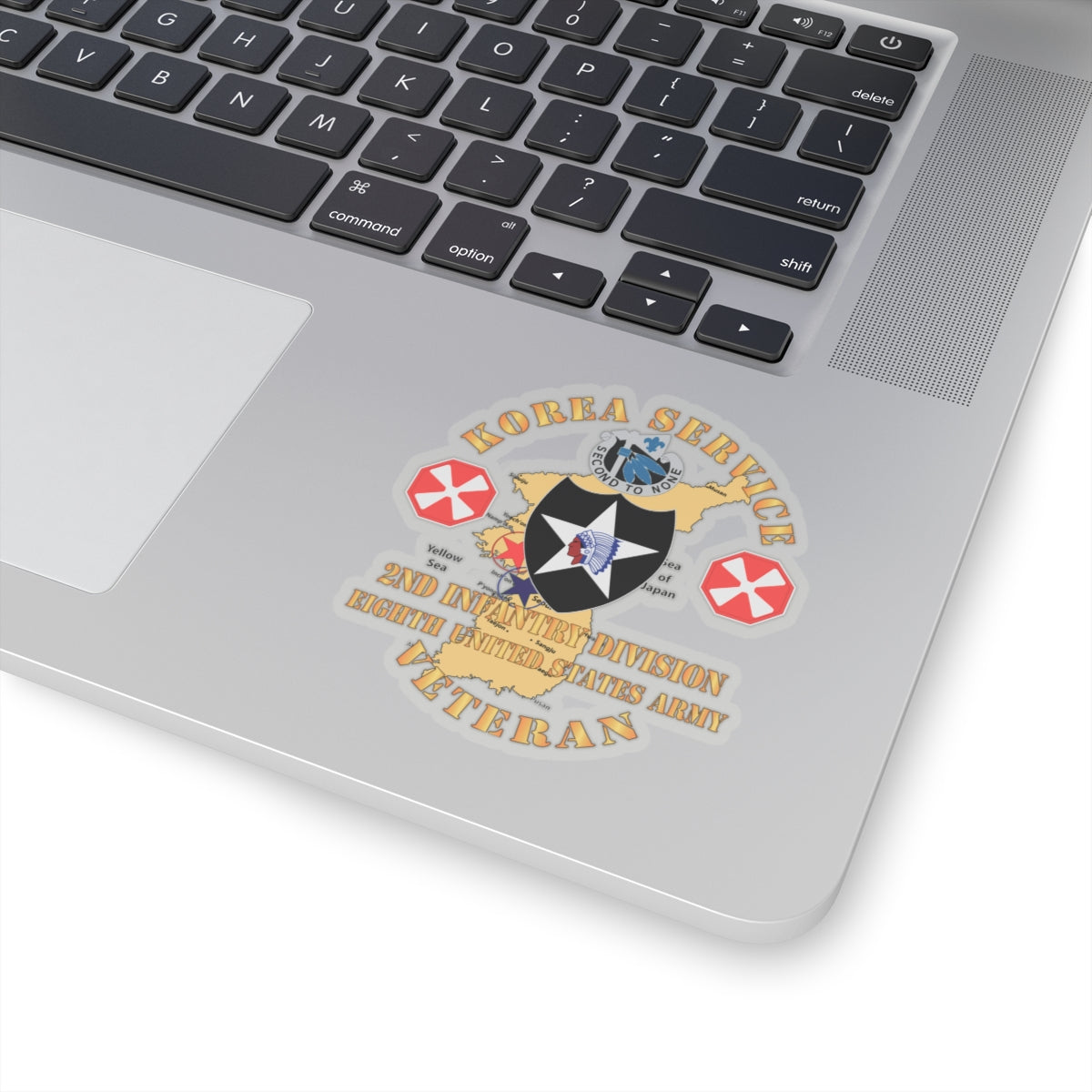 A sticker with a graphic representing the Korea Service Veteran, 2nd Infantry Division, 8th United States Army. It features a map of Korea, a star, and decorative elements in a circular design.