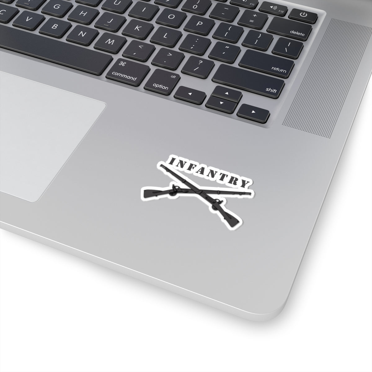 A sticker with a design of crossed black rifles and the text 'INFANTRY'.