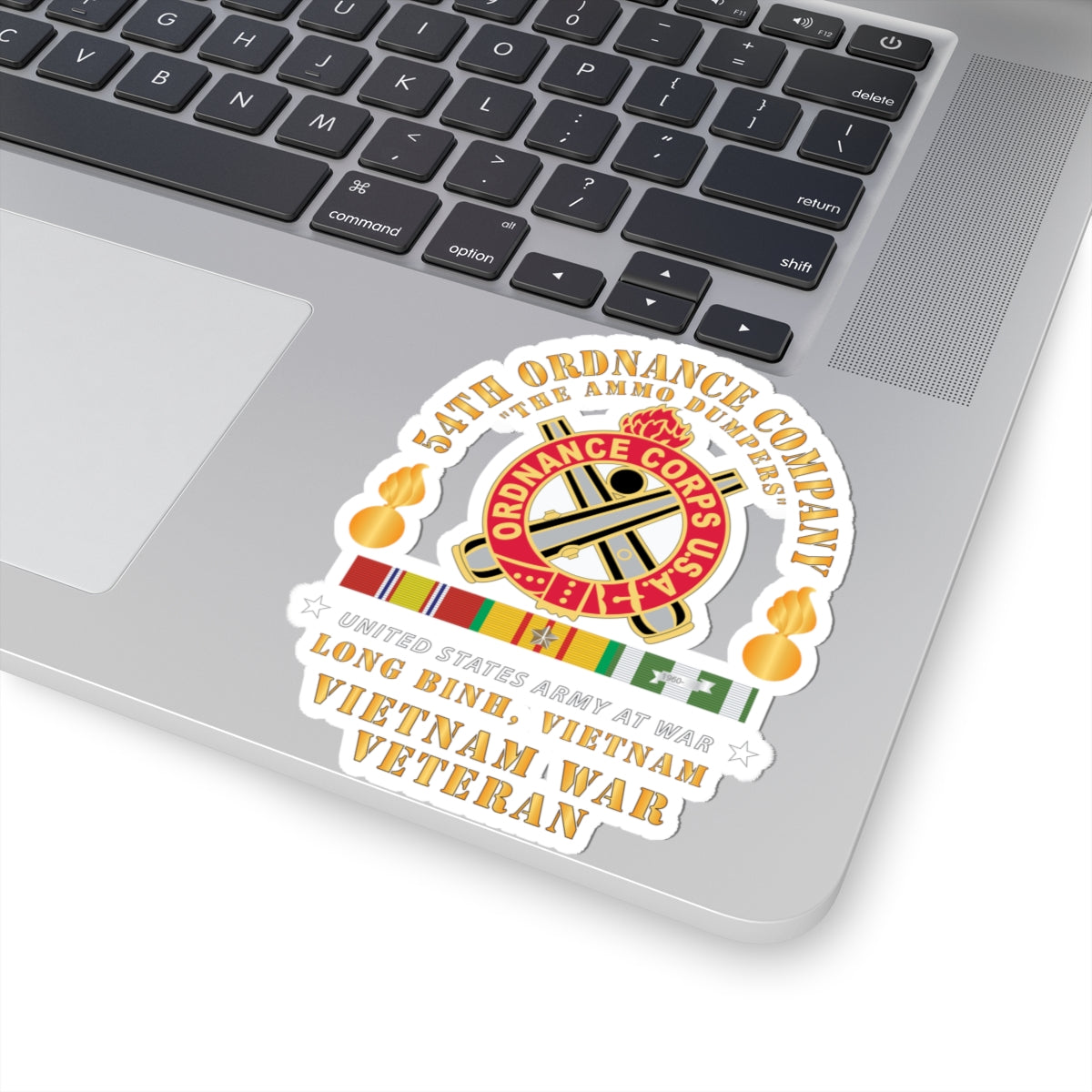 A sticker featuring the emblem of the 54th Ordnance Company with a 'Vietnam War Veteran' inscription and decorative elements in red, white, and yellow colors.