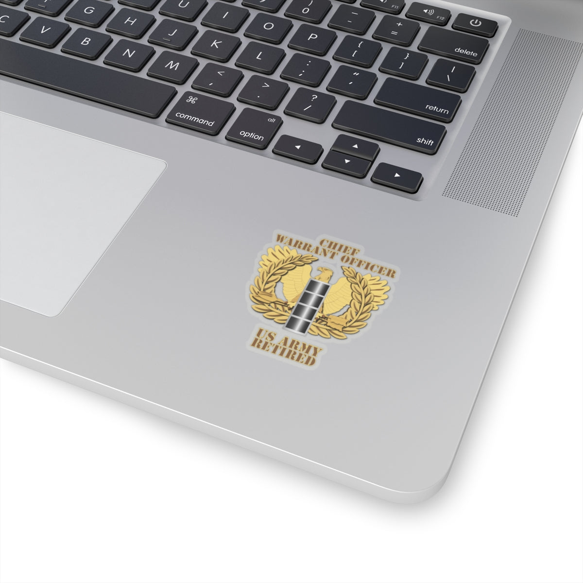 A emblem sticker with the text 'CHIEF WARRANT OFFICER US ARMY RETIRED' designed in a military style with a gold background, a silver star, and laurel wreath.