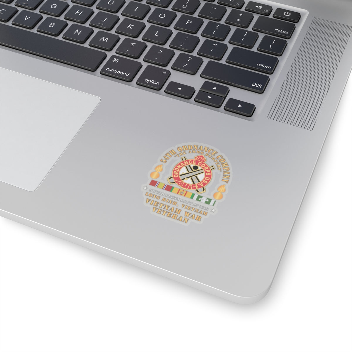 A sticker featuring the emblem of the 54th Ordnance Company with a 'Vietnam War Veteran' inscription and decorative elements in red, white, and yellow colors.