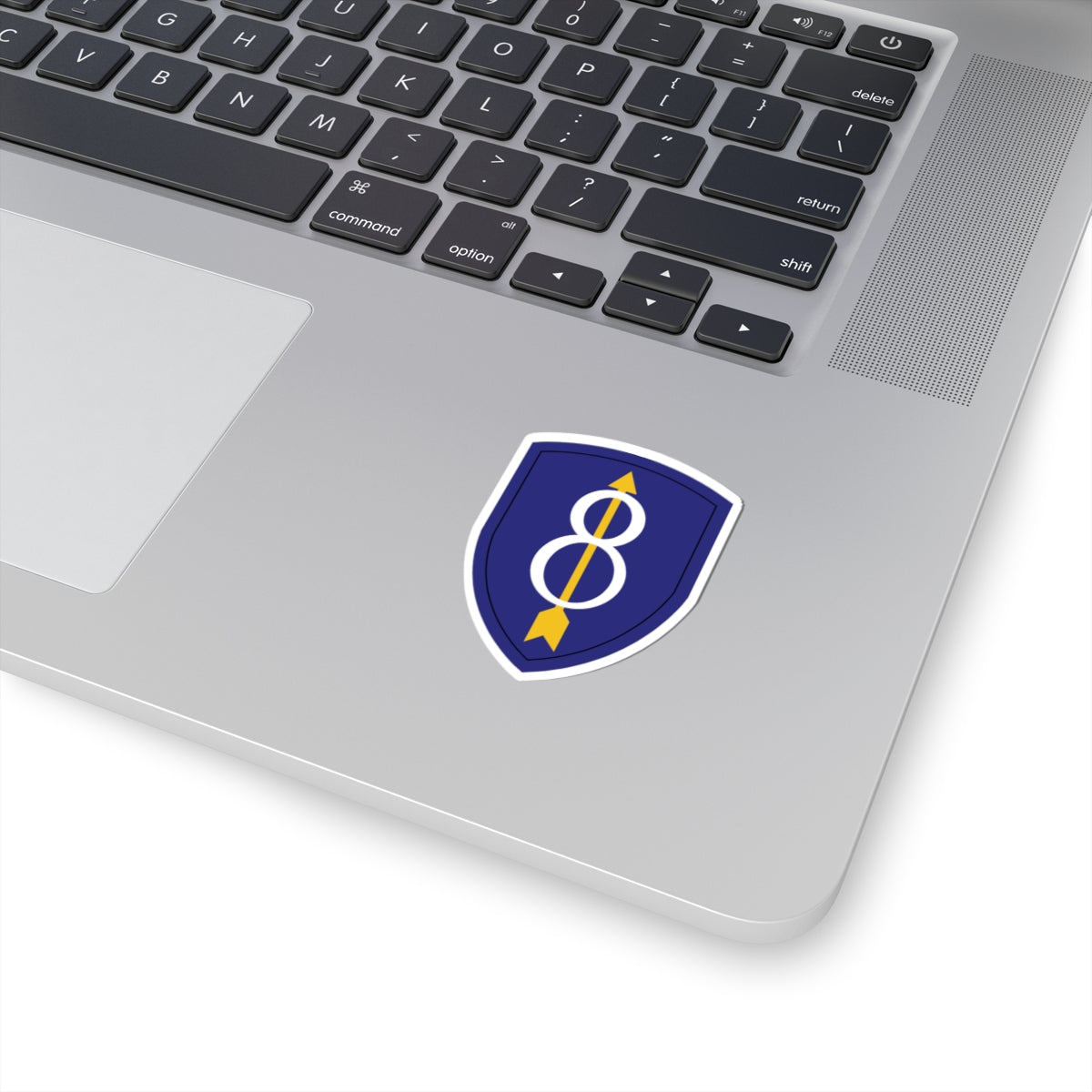 A kiss-Cut Stickers depicting the 8th Infantry Division, known as the "Pathfinder Division," served with distinction in World War I, World War II, and the Cold War. Its shoulder sleeve insignia (SSI) features a gold numeral "8" on a blue shield with a red border, symbolizing strength and tradition.