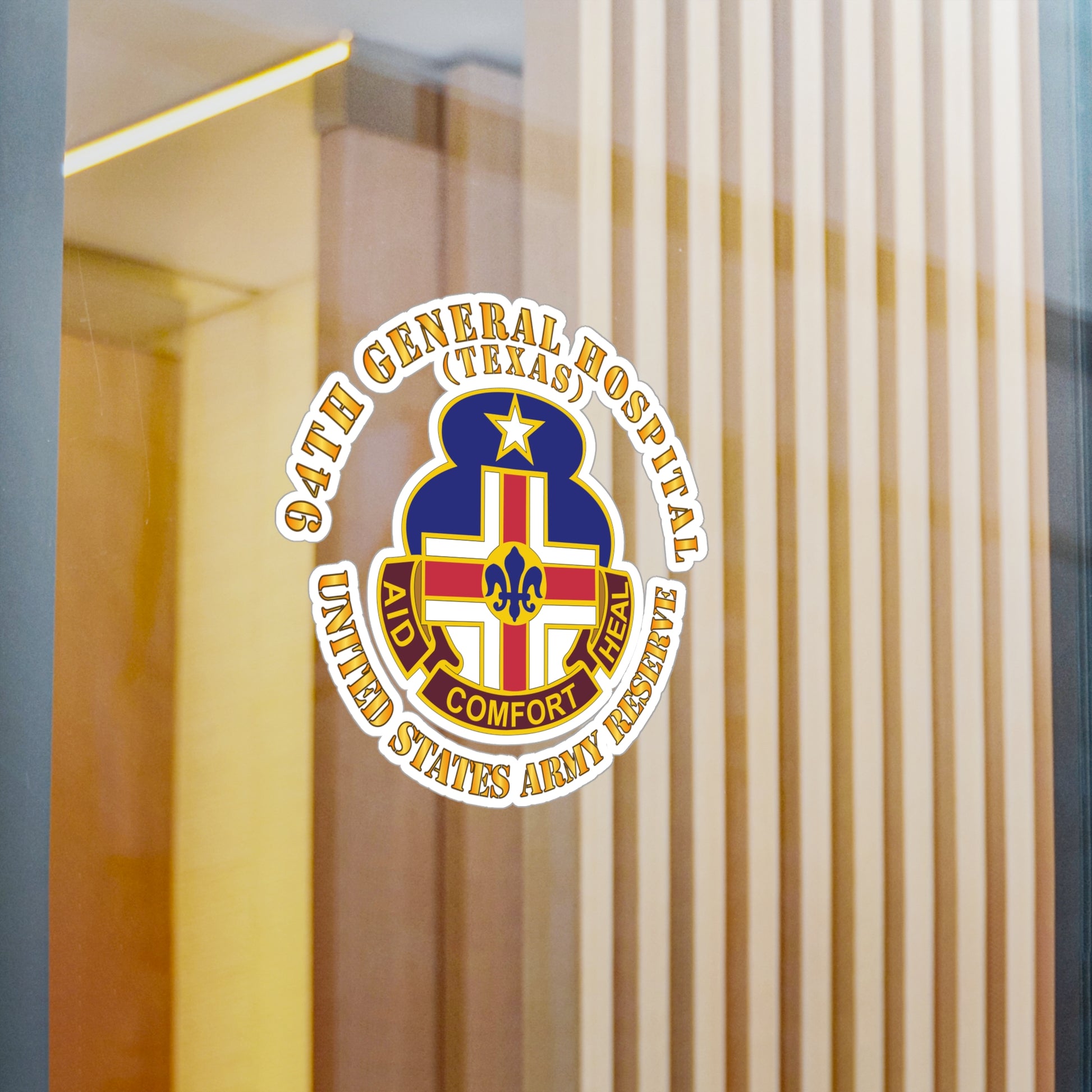 A circular white vinyl decal with a colorful emblem representing the 94th General Hospital, Texas, in the center.